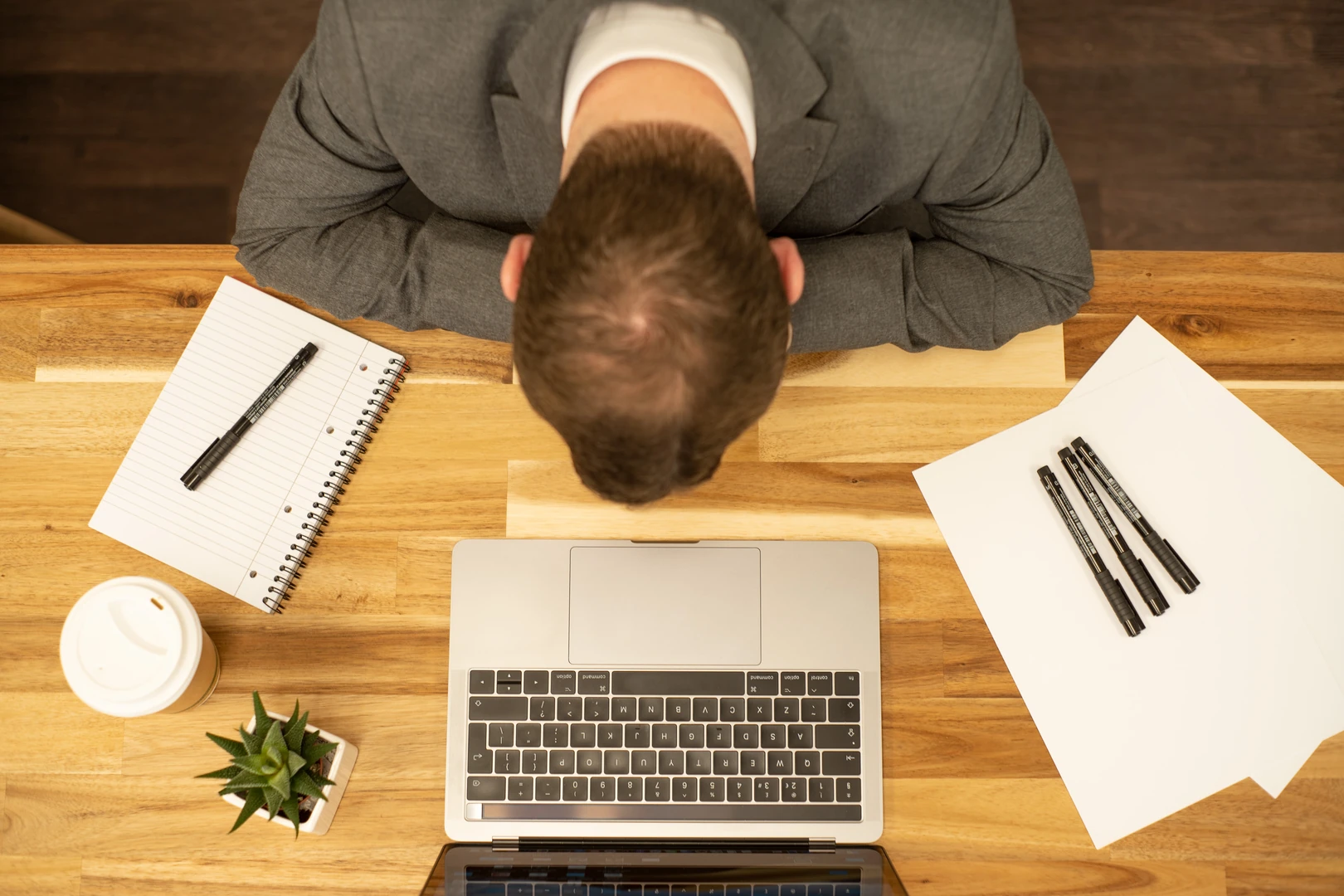 Man showing signs of work-related stress